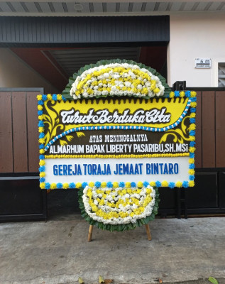 Papan Bunga Duka di Sangrawayang